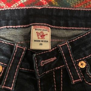 Pink white true religion